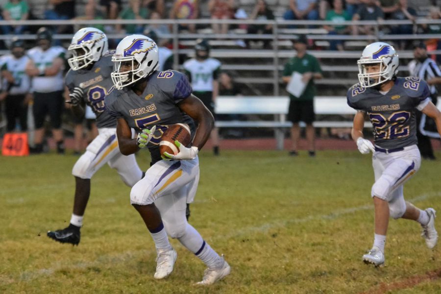 Jaylon Shields guards the ball and makes a run down the field (Lifetouch). Shields graduated with the class of 2020.