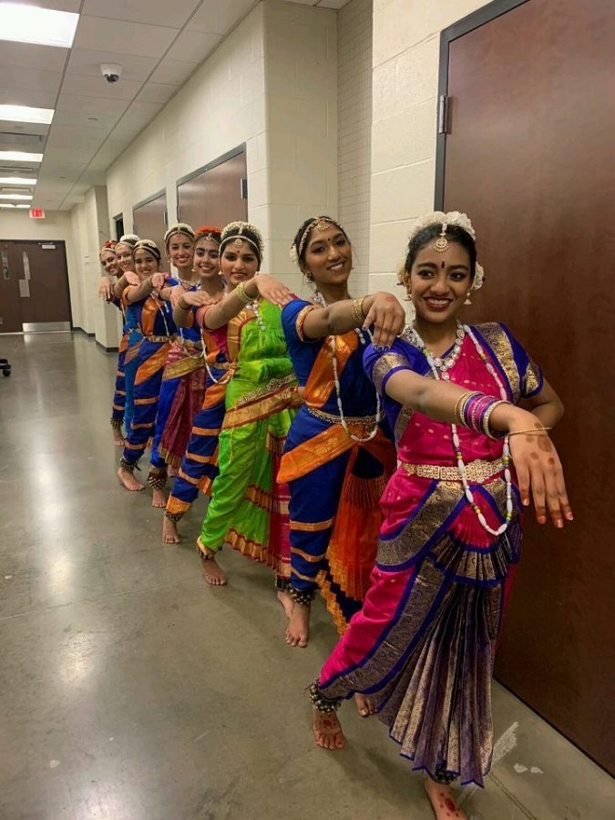 Nirmita poses with her dance team for her upcoming performance