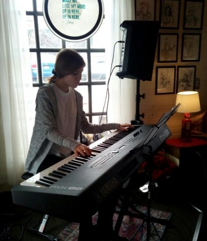 Kate at a open mic in Webster Groves, playing the keyboard.