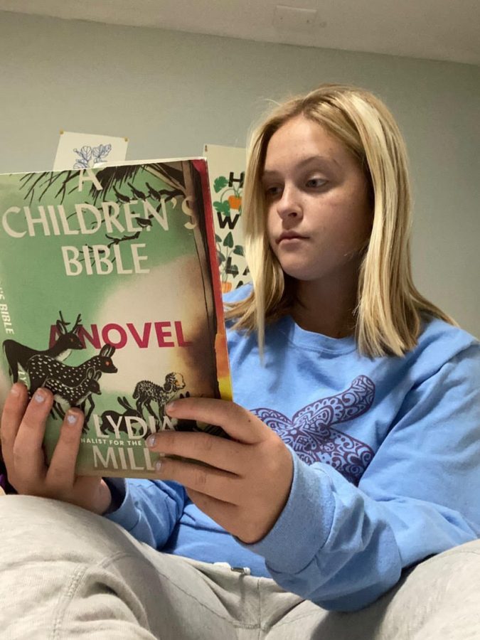 Lydia Strieker (senior) reading A Childrens Bible for Brentwood Book Buddies.