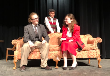 The cast of "The Rainstorm" rehearse in the auditorium after school.