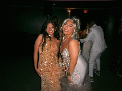 Former students Denise Tacturn and Jamia Welch get together to smile for the camera at 2023s prom.