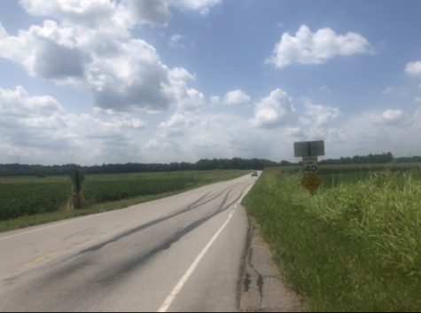 A picture I took of a countryside road known by two names, Bend Road and Hwy N, near Pacific, MO, in August 2021.