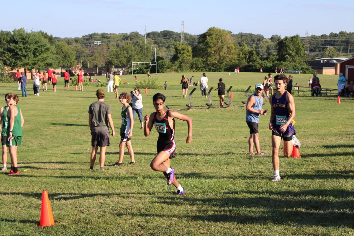 Senior Miller Chantharasy sprints the finish at last weeks Parkway Central Invitational, passing several runners right at the end. 