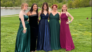 Teagan Karetski Smythe, Norah Woodman, Emelda Forney, Amelia Spencer and Haven White pose for prom April 2023.