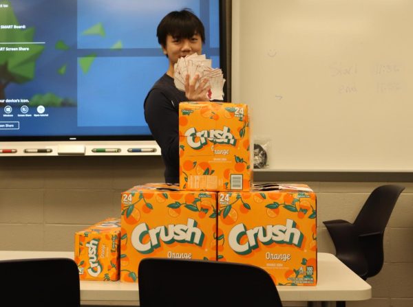 Freshman John Li has his 100+ Crush cans delivered to his advisory.