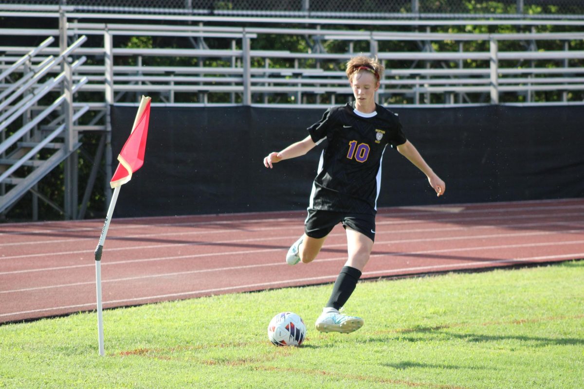 Tyler Nelson, a junior, takes a corner kick at Sept. 4th's game against Gateway STEM. The Eagles won 5-3 with Nelson scoring one of those goals. 