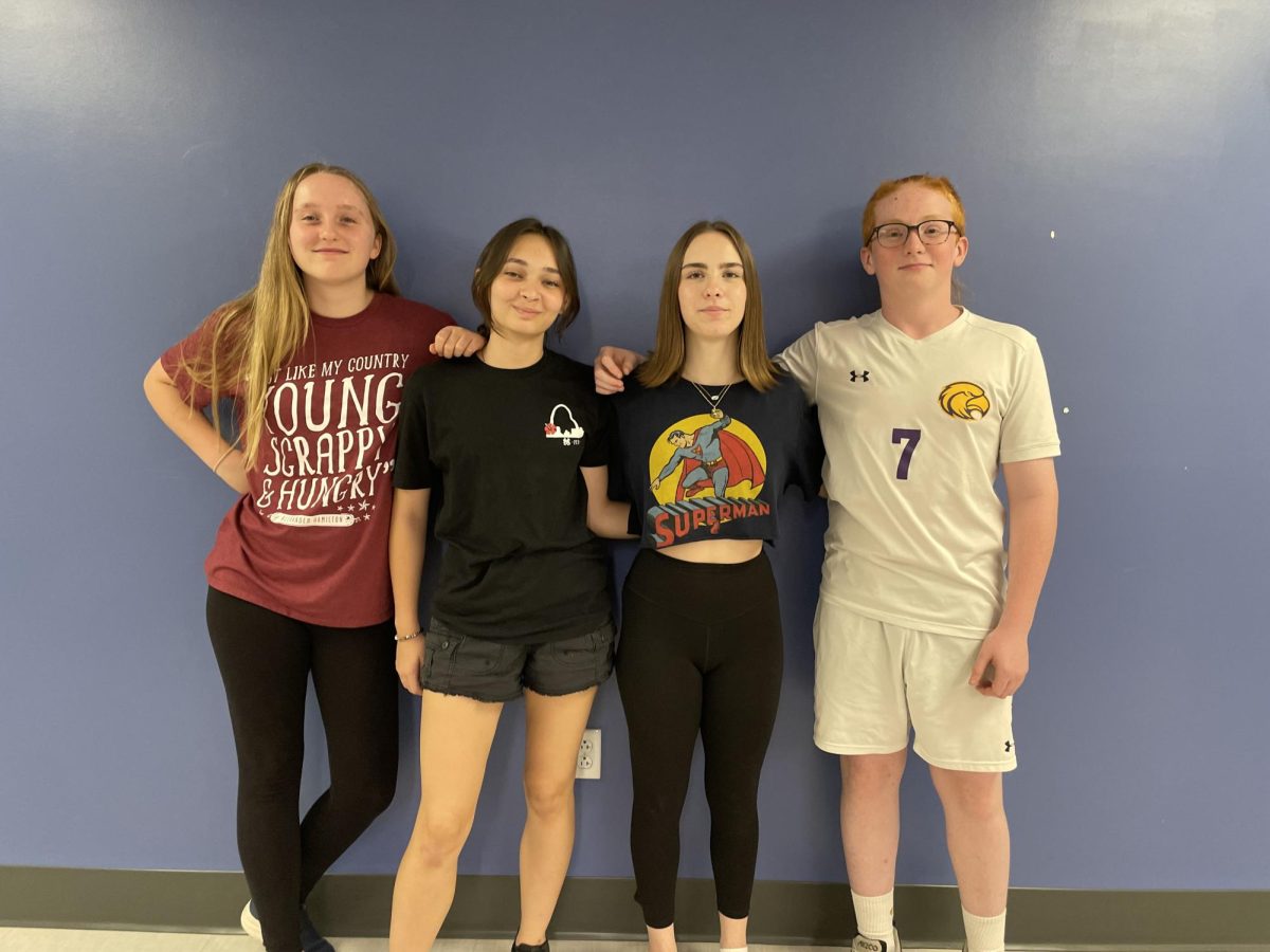 Treasurer Sarah Paul (9), Vice President Violet Abshier (9), President Antonina Militello (9), and Secretary Bodhi Torno (9) pose together for a picture. 