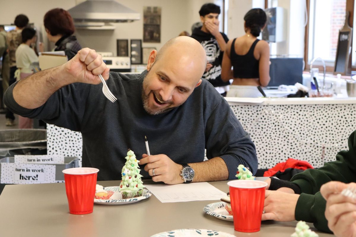 Mr. Hadman gets ready to judge the cupcakes!