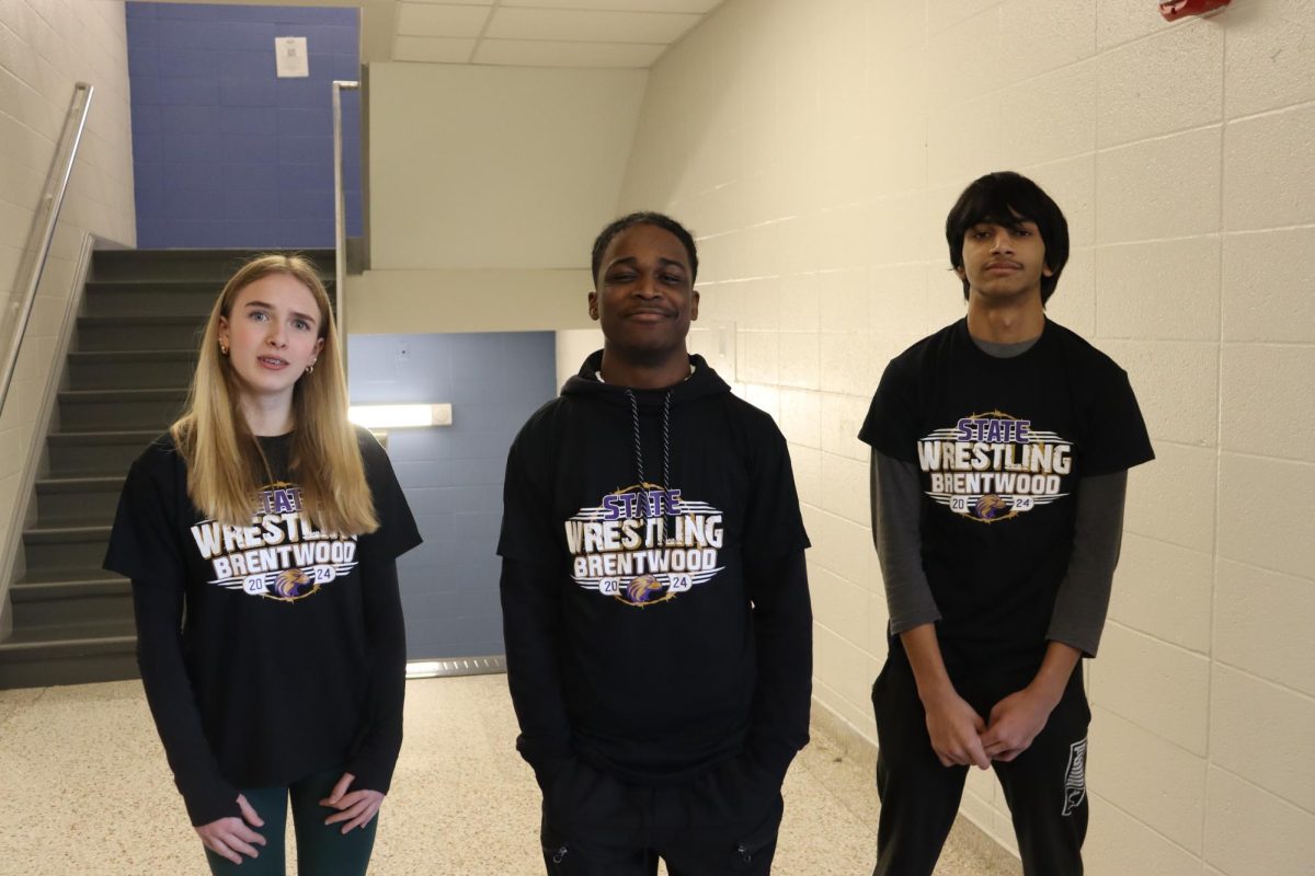 Pictured are Ashlyn Wildgrube (10), Jesse Lane (12), Ayyan Hussain (10) as they read to the state tournament last season. All three wrestlers are back this year! 