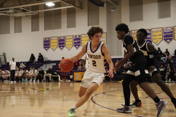 Last night in a game against Collegiate, senior Logan Hawkins scored his 1000th point! Pictured here, Hawkins plays in a game against McKinley during his junior year. 