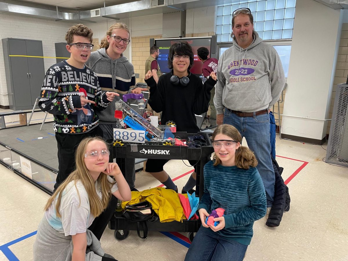 Mr. Heinrich with the past robotics team